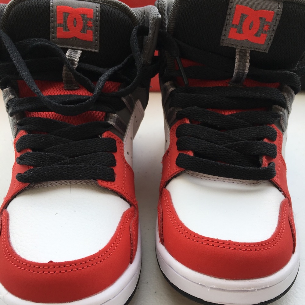 Brand new DC sneakers size 4